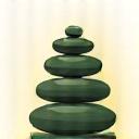 Icona stilizzata di pietre calde impilate.